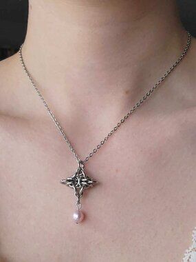 Vintage silver and pink pearl necklace with a small silver chain